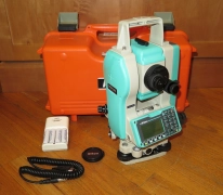 Nikon DTM-322 Precision Surveying Total Station, AA Battery Holder, Cable & Case