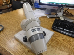 Nikon Model: SMZ-2T Trinocular Stereo Microscope with Nikon 20x/12 Eyepieces.