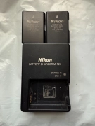 Two (2) Nikon EN-EL14 1030mAh Li-Ion Batteries and an MH-24 charger