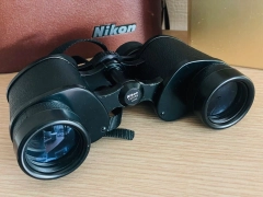 Nikon Binoculars 10x35E with Original Box For parts Sold As IS