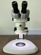 NIKON SMZ 645 8X-50X MICROSCOPE. WITH NIKON TRACK STAND AND RING LIGHT